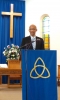 Rev. Frank Goveia with a commendation from Dave's previous church